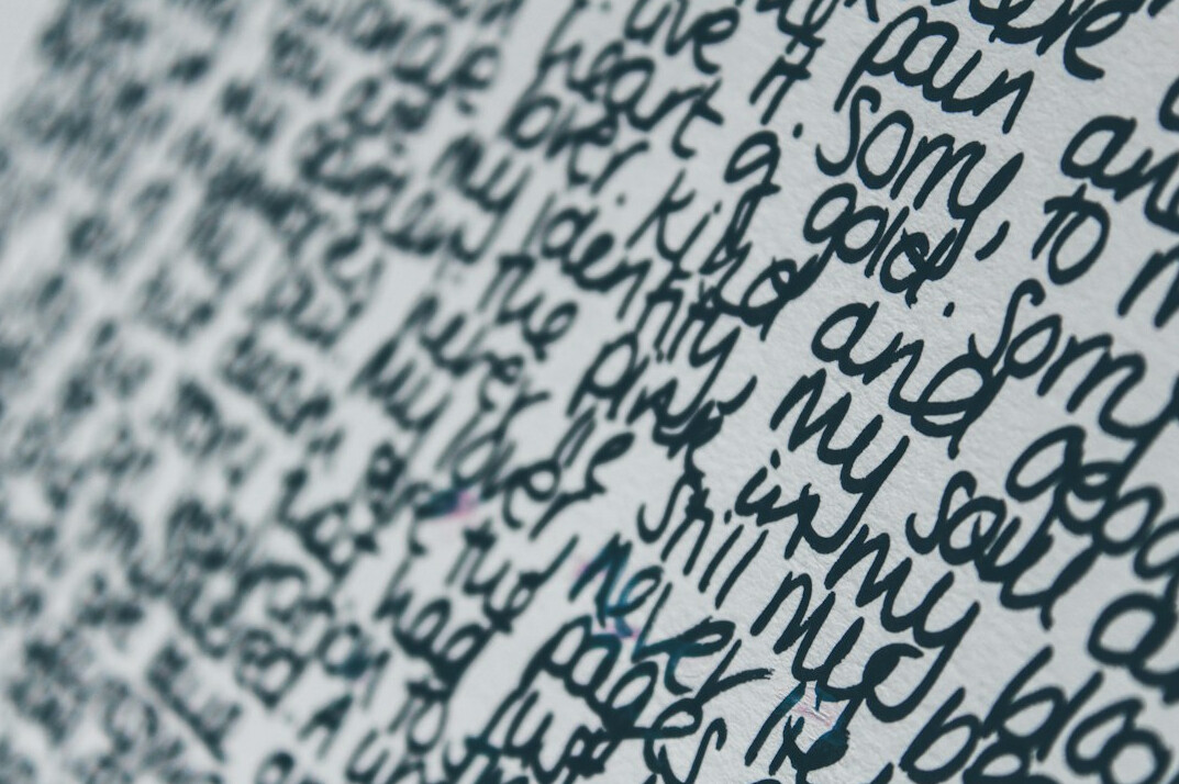 Close-up of handwritten notes on a notebook